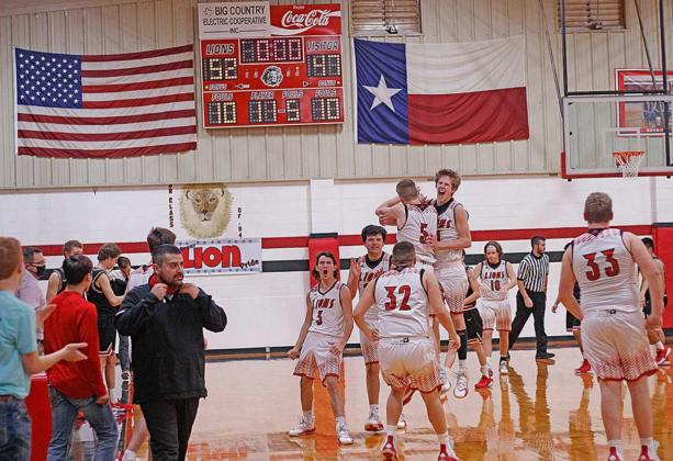 Roby Lions celebrate a hard fought victory over the Aspermont Hornets (Photo by Mark Martinez)