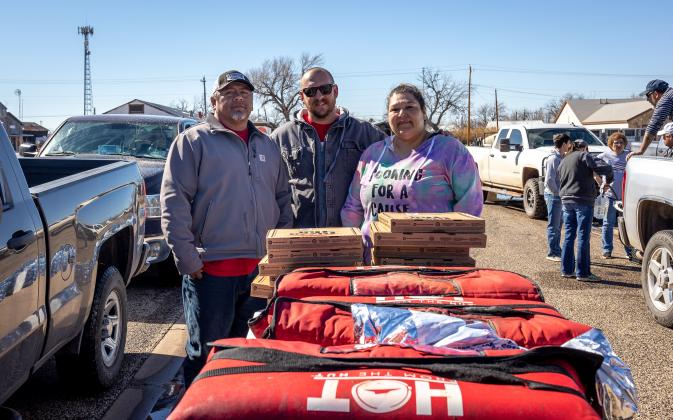 Aspermont City Administrator, Lorenzo Calamaco, Aspermont Mayor Steven Ellis and Melissa Velasquez from Cooking for a Cause