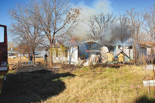 Firefighters battle Rotan house fire