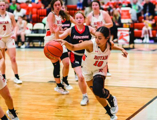 Rotan Junior Shyanne Gaspar narrowly keeps the ball in play during the Lady Hammers' 27- 46 loss to Aspermont Tuesday night. PHOTO BY MARK MARTINEZ